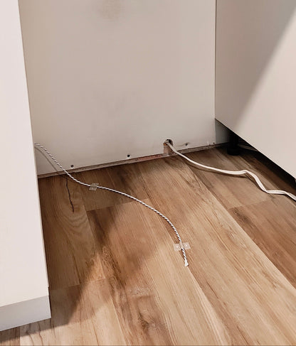 Rope sensor in dishwasher cabinet